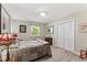 Bright bedroom with neutral walls, large closet, and a comfortable bed at 908 Clarion Dr, Durham, NC 27705
