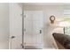 Bright entryway with a white door, neutral walls, and minimalist decor, creating a clean and welcoming ambiance at 908 Clarion Dr, Durham, NC 27705