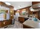 The kitchen is equipped with wood cabinets and modern appliances at 908 Clarion Dr, Durham, NC 27705