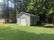 View of the storage shed showing easy access for your vehicles and equipment at 908 Clarion Dr, Durham, NC 27705