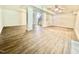 Spacious basement with modern flooring, ceiling fan, and open floor plan at 101 Creekside Dr, Selma, NC 27576