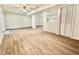 Basement area with modern flooring, shelving, and ample lighting at 101 Creekside Dr, Selma, NC 27576
