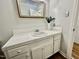 Bathroom featuring a vanity with white tiling and gold-framed mirror at 101 Creekside Dr, Selma, NC 27576