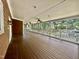 Wide-angle view of the expansive deck with white railing and wood floor, perfect for entertaining at 101 Creekside Dr, Selma, NC 27576