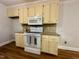 Well-appointed kitchen featuring updated appliances, countertops, and ample cabinet space at 101 Creekside Dr, Selma, NC 27576