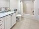 Well-lit bathroom featuring a tub shower combination and a white vanity at 101 Painted Rock Ct, Garner, NC 27529