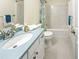 Bathroom featuring a vanity, toilet and shower/tub combo at 101 Painted Rock Ct, Garner, NC 27529