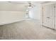 Bedroom with neutral walls, carpeted floors, and closet doors at 101 Painted Rock Ct, Garner, NC 27529