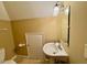 Bathroom with a pedestal sink, mirror, toilet and a storage closet at 105 Abbotsford Ct, Durham, NC 27712