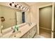 Bathroom features dual sinks, a large mirror, and modern lighting fixtures at 105 Abbotsford Ct, Durham, NC 27712