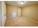 This bedroom has neutral carpet, a light, and light-colored walls at 105 Abbotsford Ct, Durham, NC 27712
