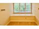 Cozy reading nook featuring a window seat and window with natural lighting at 105 Abbotsford Ct, Durham, NC 27712