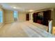 Spacious bonus room with carpet and built-in shelving at 105 Abbotsford Ct, Durham, NC 27712