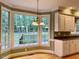 Bright breakfast nook with natural light and views of the backyard at 105 Abbotsford Ct, Durham, NC 27712