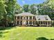 Beautiful brick home featuring a well-kept lawn and classic design at 105 Abbotsford Ct, Durham, NC 27712