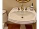 Close-up of half-bathroom featuring an ornate sink and faucet at 105 Abbotsford Ct, Durham, NC 27712