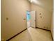 A spacious laundry room featuring ample space for appliances and storage with door opening to the next room at 105 Abbotsford Ct, Durham, NC 27712