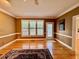 Large living room with hardwood floors and ample natural light at 105 Abbotsford Ct, Durham, NC 27712