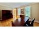 View of home office with hardwood floors and ample natural light at 105 Abbotsford Ct, Durham, NC 27712