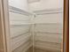 This is a pantry with white, wire shelves and white walls at 105 Abbotsford Ct, Durham, NC 27712