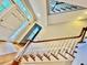Interior staircase with wood handrail and white spindles at 105 Abbotsford Ct, Durham, NC 27712