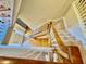 View of staircase with wooden handrail and carpeted steps leading to the next floor at 105 Abbotsford Ct, Durham, NC 27712