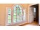 Arched window providing ample natural light, enhancing the room's appeal at 105 Abbotsford Ct, Durham, NC 27712