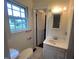 Bright bathroom with natural light from the window, tile floors, and vanity at 1116 Friendly Rd, Dunn, NC 28334
