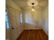 Welcoming entryway featuring hardwood floors and elegant lighting at 1116 Friendly Rd, Dunn, NC 28334