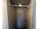 Shower with tile walls and a shower head at 1116 Friendly Rd, Dunn, NC 28334