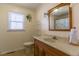 Bathroom features a large sink, ample counter space, and a window at 1186 Dick Holeman Rd, Timberlake, NC 27583