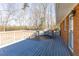 Inviting outdoor deck, perfect for relaxation, with a brick home exterior at 1186 Dick Holeman Rd, Timberlake, NC 27583
