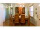Dining room with hardwood floors, large window, and an elegant chandelier at 1186 Dick Holeman Rd, Timberlake, NC 27583