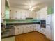 Cozy kitchen featuring a full complement of appliances and plenty of cabinet storage at 1186 Dick Holeman Rd, Timberlake, NC 27583