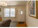 The living room is filled with natural light and plush sofas, creating an inviting space at 1186 Dick Holeman Rd, Timberlake, NC 27583