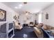 Bright living room with a comfortable sofa, desk and lots of natural light from the windows at 1186 Dick Holeman Rd, Timberlake, NC 27583