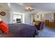 Spacious main bedroom features a ceiling fan and plenty of closet space at 1186 Dick Holeman Rd, Timberlake, NC 27583