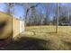 Shed with white doors and tan siding, set on a grassy lot with a small wooden platform at 1186 Dick Holeman Rd, Timberlake, NC 27583