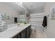 Bathroom features a single vanity with a marble countertop and a shower curtain at 120 Silver Bluff St, Holly Springs, NC 27540