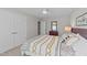 Cozy bedroom with neutral walls, soft carpet, and ample natural light at 120 Silver Bluff St, Holly Springs, NC 27540