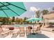 Relaxing pool area with lounge chairs, umbrellas, and a view of the swimming lanes, ideal for a leisurely afternoon at 120 Silver Bluff St, Holly Springs, NC 27540