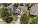 Beautiful aerial view of a home with a landscaped yard and a charming front porch in a desirable neighborhood at 120 Silver Bluff St, Holly Springs, NC 27540