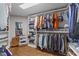 Spacious walk-in closet offers custom shelving and ample storage at 120 Silver Bluff St, Holly Springs, NC 27540