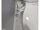 Close-up of a bidet attachment for a standard white toilet at 121 Brentfield Loop, Morrisville, NC 27560