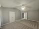Spacious main bedroom featuring vaulted ceiling with fan and neutral carpeting at 121 Brentfield Loop, Morrisville, NC 27560