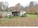 Image displaying detached storage and backyard at 124 Jack Bennett Rd, Chapel Hill, NC 27517