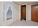 Small bedroom featuring a closet and window with lace curtains at 124 Jack Bennett Rd, Chapel Hill, NC 27517