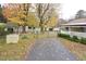 Image featuring driveway, shed, and backyard at 124 Jack Bennett Rd, Chapel Hill, NC 27517
