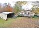 Exterior view of property with shed and ramp at 124 Jack Bennett Rd, Chapel Hill, NC 27517