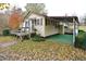 Exterior of the home with the ramp and deck at 124 Jack Bennett Rd, Chapel Hill, NC 27517